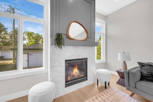 8114 Bowness Road Nw, Calgary, AB - Indoor Photo Showing Living Room With Fireplace
