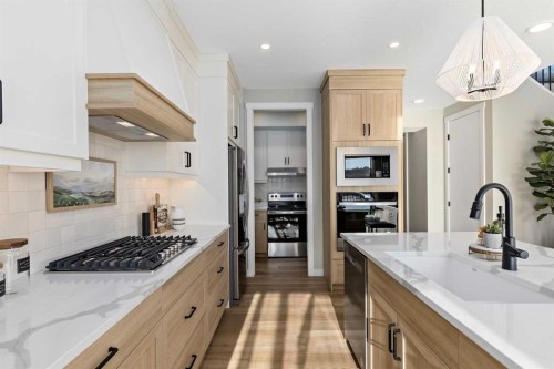 134 Belmont Passage Sw, Calgary, AB - Indoor Photo Showing Kitchen With Upgraded Kitchen