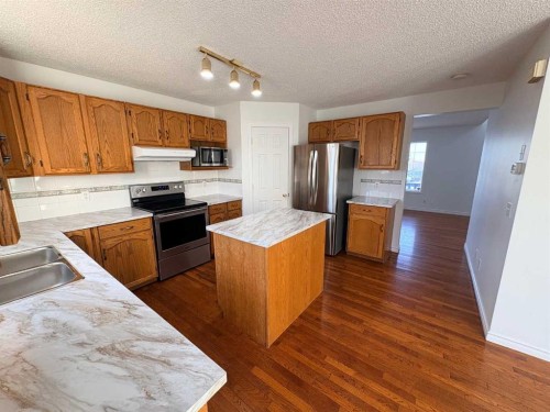 7901 Martha'S Haven Park Ne, Calgary, AB - Indoor Photo Showing Kitchen With Stainless Steel Kitchen With Double Sink