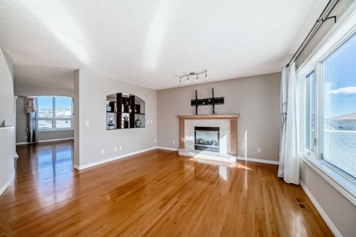 300 Hampstead Road Nw, Calgary, AB - Indoor Photo Showing Living Room With Fireplace