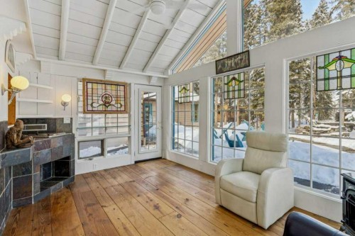 4 Pine Avenue, Bragg Creek, AB - Indoor With Fireplace