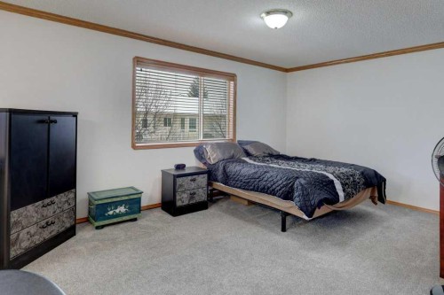 182 Harvest Creek Close Ne, Calgary, AB - Indoor Photo Showing Bedroom