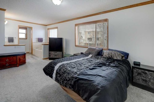 182 Harvest Creek Close Ne, Calgary, AB - Indoor Photo Showing Bedroom