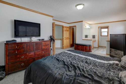 182 Harvest Creek Close Ne, Calgary, AB - Indoor Photo Showing Bedroom