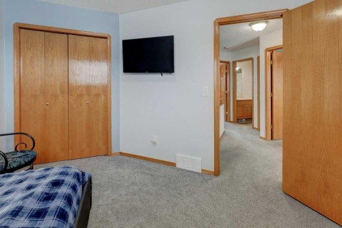 182 Harvest Creek Close Ne, Calgary, AB - Indoor Photo Showing Bedroom