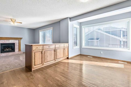 303 Schubert Place Nw, Calgary, AB - Indoor With Fireplace