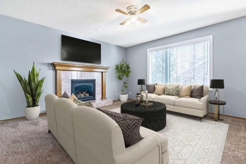 303 Schubert Place Nw, Calgary, AB - Indoor Photo Showing Living Room With Fireplace
