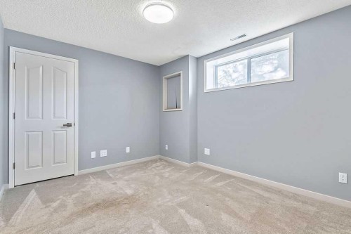 303 Schubert Place Nw, Calgary, AB - Indoor Photo Showing Other Room