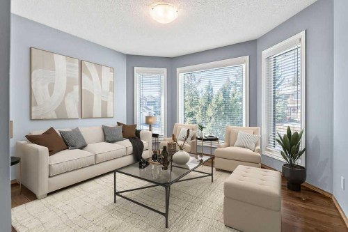 303 Schubert Place Nw, Calgary, AB - Indoor Photo Showing Living Room
