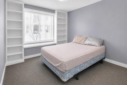 203-345 Rocky Vista Park Nw, Calgary, AB - Indoor Photo Showing Bedroom