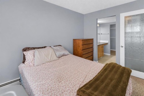 203-345 Rocky Vista Park Nw, Calgary, AB - Indoor Photo Showing Bedroom
