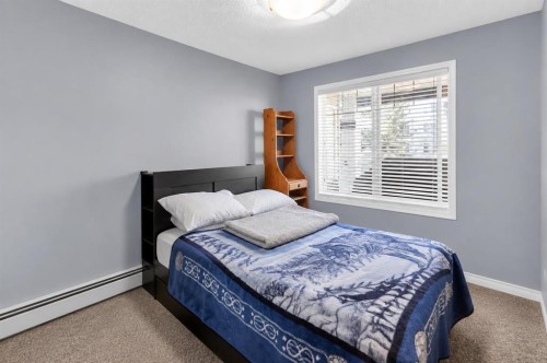 203-345 Rocky Vista Park Nw, Calgary, AB - Indoor Photo Showing Bedroom