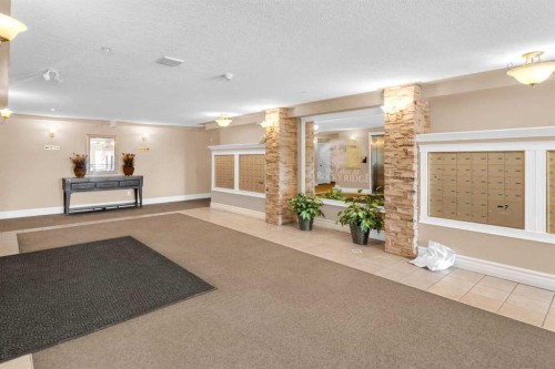203-345 Rocky Vista Park Nw, Calgary, AB - Indoor Photo Showing Other Room