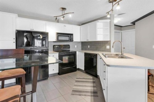 203-345 Rocky Vista Park Nw, Calgary, AB - Indoor Photo Showing Kitchen With Double Sink