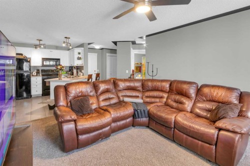 203-345 Rocky Vista Park Nw, Calgary, AB - Indoor Photo Showing Living Room