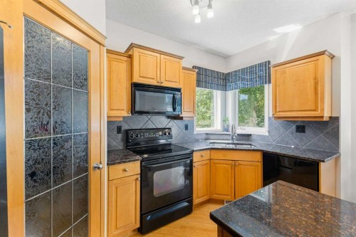 11 Simcoe Crescent Sw, Calgary, AB - Indoor Photo Showing Kitchen With Double Sink
