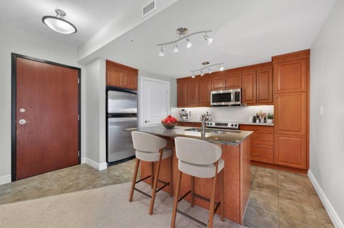 1402-910 5 Avenue Sw, Calgary, AB - Indoor Photo Showing Kitchen With Stainless Steel Kitchen