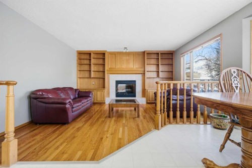 146 Hawkdale Circle Nw, Calgary, AB - Indoor With Fireplace