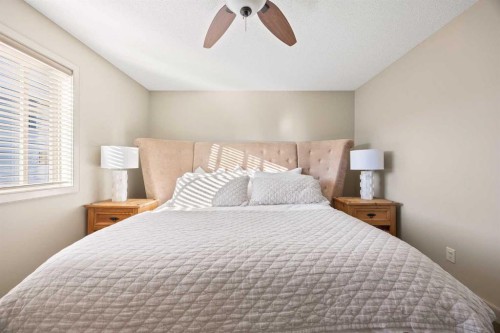 80 Tuscany Summit Terrace Nw, Calgary, AB - Indoor Photo Showing Bedroom