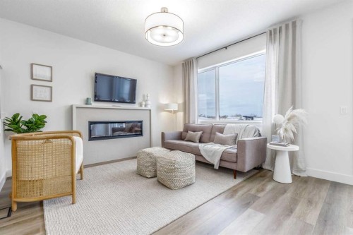 447 Rivercrest Road, Cochrane, AB - Indoor Photo Showing Living Room With Fireplace