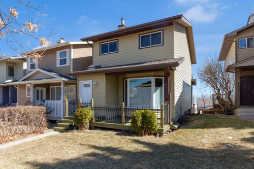 604 Strathcona Drive Sw, Calgary, AB - Outdoor With Deck Patio Veranda With Facade