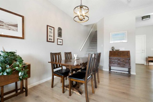 46 Emberside Place, Cochrane, AB - Indoor Photo Showing Dining Room