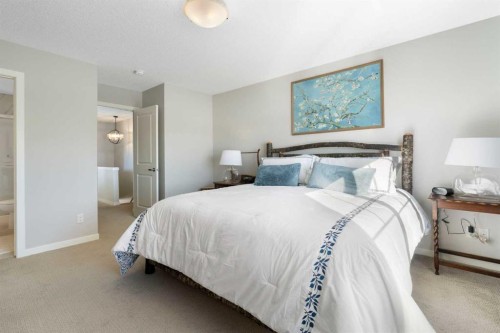 46 Emberside Place, Cochrane, AB - Indoor Photo Showing Bedroom