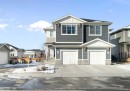 46 Emberside Place, Cochrane, AB  - Outdoor With Facade 
