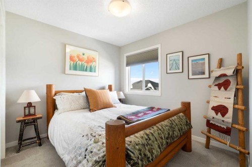 46 Emberside Place, Cochrane, AB - Indoor Photo Showing Bedroom