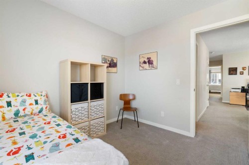 46 Emberside Place, Cochrane, AB - Indoor Photo Showing Bedroom