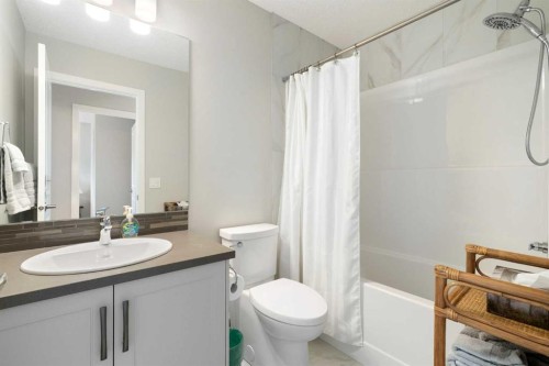 46 Emberside Place, Cochrane, AB - Indoor Photo Showing Bathroom