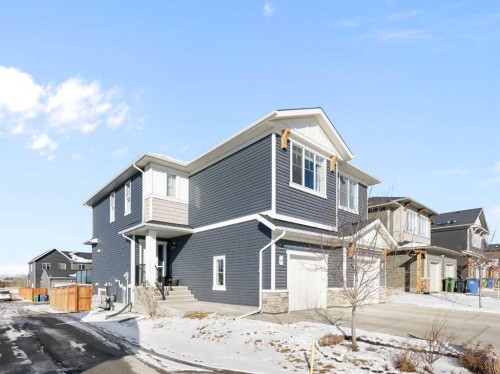 46 Emberside Place, Cochrane, AB - Outdoor With Facade