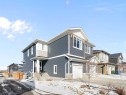 46 Emberside Place, Cochrane, AB  - Outdoor With Facade 