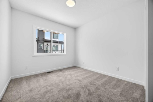66 Creekside Way Sw, Calgary, AB - Indoor Photo Showing Other Room