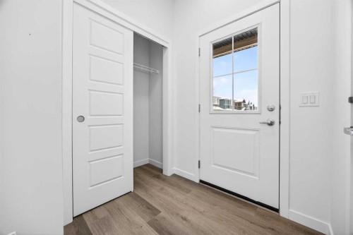 66 Creekside Way Sw, Calgary, AB - Indoor Photo Showing Other Room