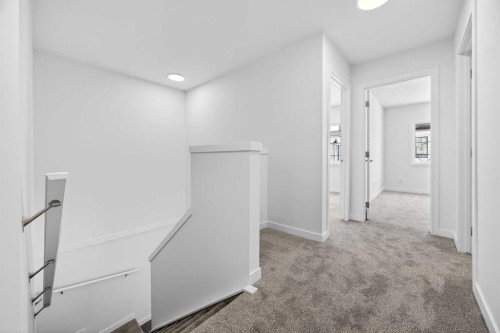 66 Creekside Way Sw, Calgary, AB - Indoor Photo Showing Other Room