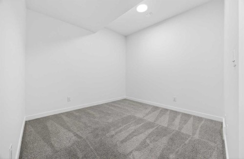 66 Creekside Way Sw, Calgary, AB - Indoor Photo Showing Other Room