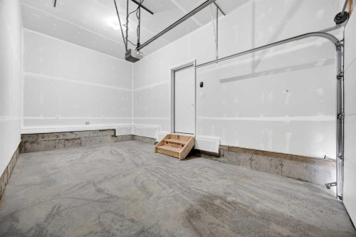 66 Creekside Way Sw, Calgary, AB - Indoor Photo Showing Other Room