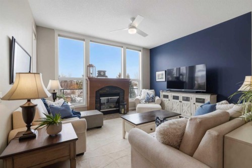 71 Elgin Estates Hill Se, Calgary, AB - Indoor Photo Showing Living Room With Fireplace