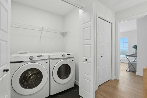 45 Wild Rose Way Se, Calgary, AB - Indoor Photo Showing Laundry Room