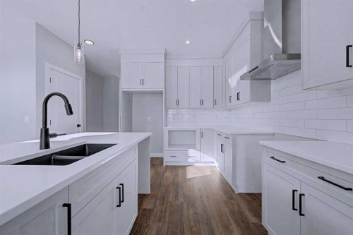 41 Ambleton Boulevard Nw, Calgary, AB - Indoor Photo Showing Kitchen With Double Sink