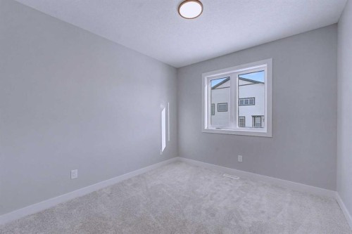 41 Ambleton Boulevard Nw, Calgary, AB - Indoor Photo Showing Other Room