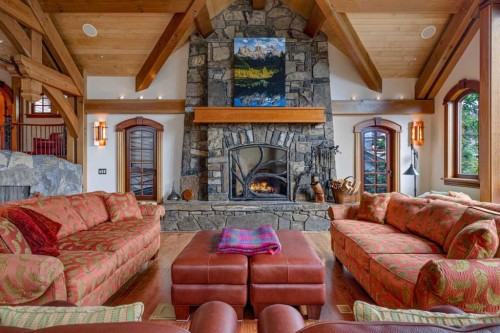 145 Silvertip Ridge, Canmore, AB - Indoor Photo Showing Living Room With Fireplace