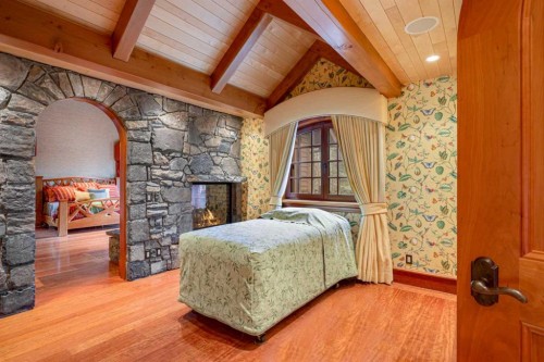 145 Silvertip Ridge, Canmore, AB - Indoor Photo Showing Other Room With Fireplace