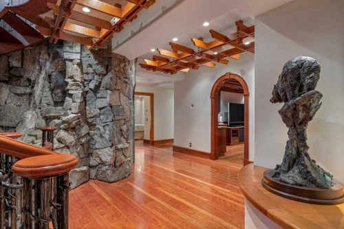 145 Silvertip Ridge, Canmore, AB - Indoor Photo Showing Other Room With Fireplace