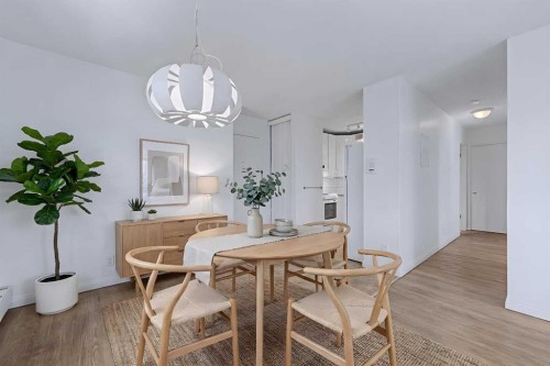 402C-5601 Dalton Drive Nw, Calgary, AB - Indoor Photo Showing Dining Room