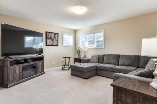 26 Mount Rae Terrace, Okotoks, AB - Indoor Photo Showing Living Room