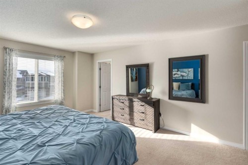 26 Mount Rae Terrace, Okotoks, AB - Indoor Photo Showing Bedroom