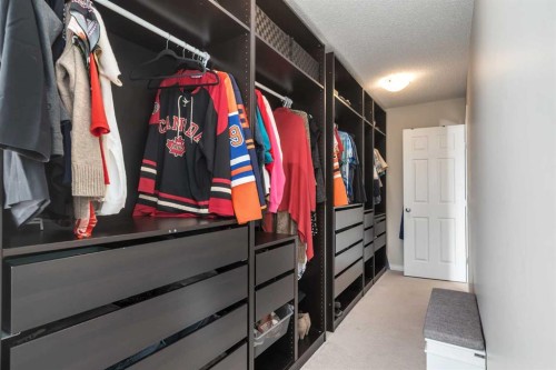 26 Mount Rae Terrace, Okotoks, AB - Indoor With Storage