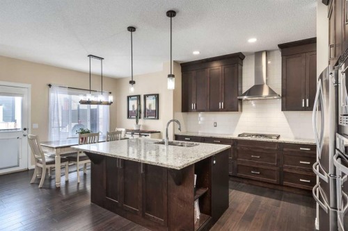 26 Mount Rae Terrace, Okotoks, AB - Indoor Photo Showing Kitchen With Upgraded Kitchen